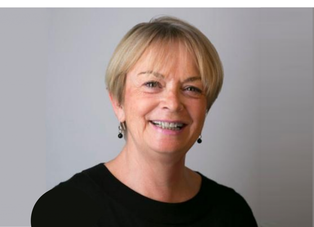 Jo O’Brien Exec Photo 2020 Jo O'Brien smiling with short hair and black top